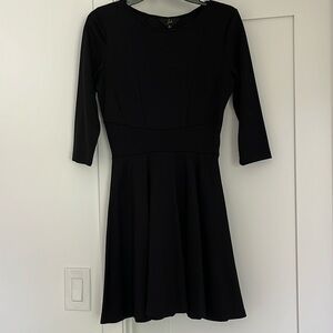 Classic, black dress with cutout. Size 4